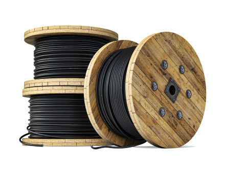3 spools of black wire. One spool is leaning against the other two, which are stacked.